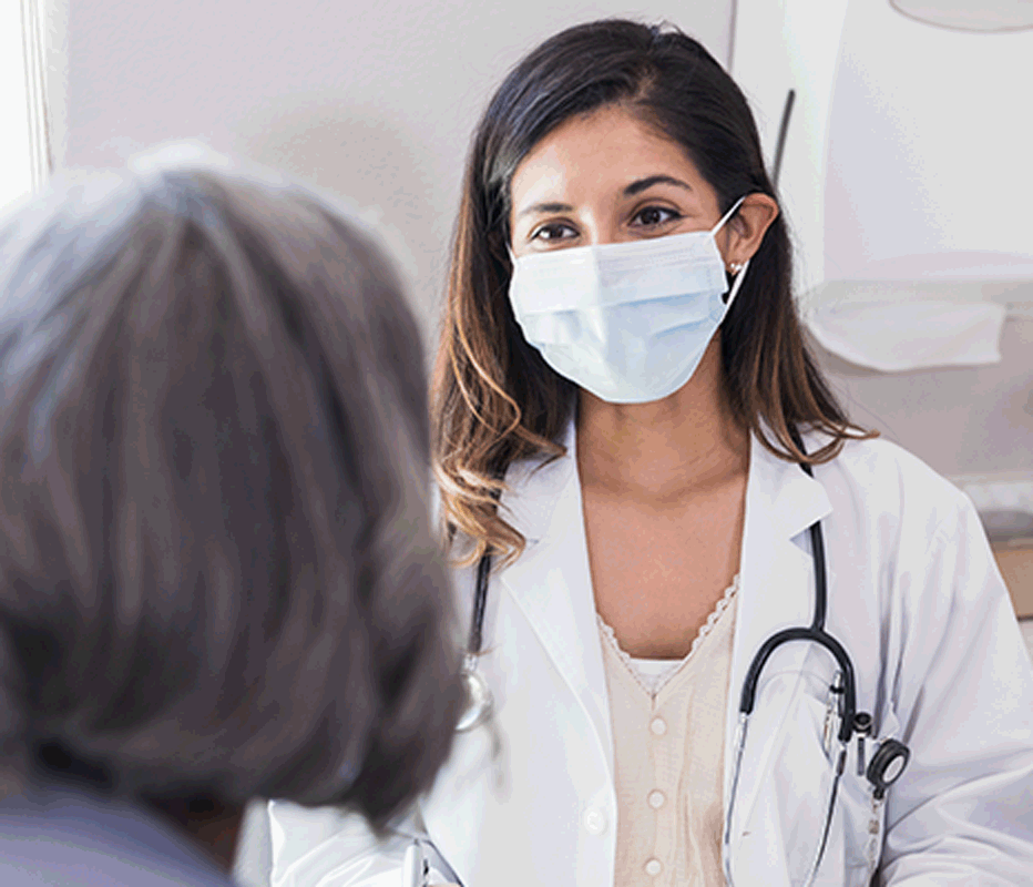 A woman healthcare professional talking with a patient